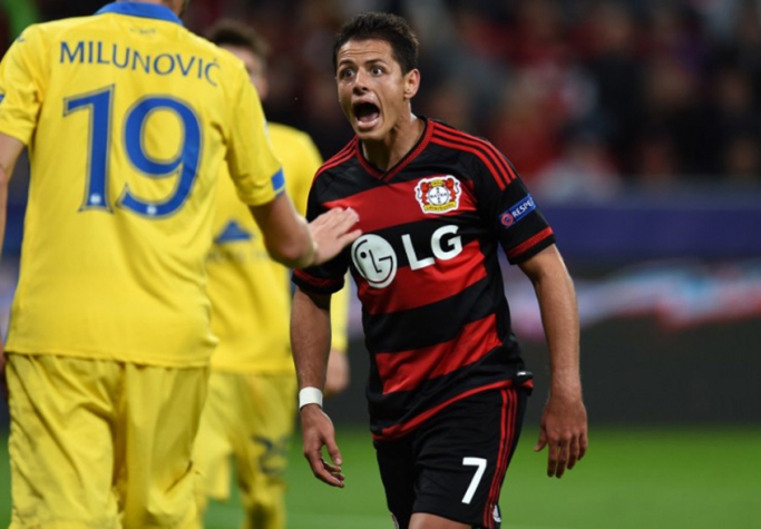 Vice-lÃder do grupo E, o Bayer Leverkusen tem o melhor ataque da Liga, com 9 gols. Três deles, marcados por Chicharito Hernández (AFP PHOTO / PATRIK STOLLARZ)