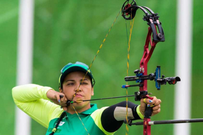 Antes de começar no tiro com arco, Jane era atleta do tênis de mesa.