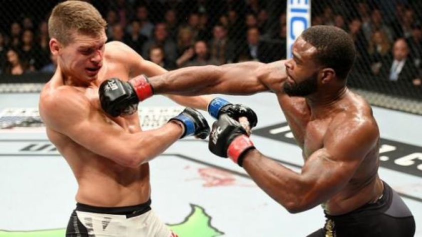 Woodley manteve o título dos meio-médios