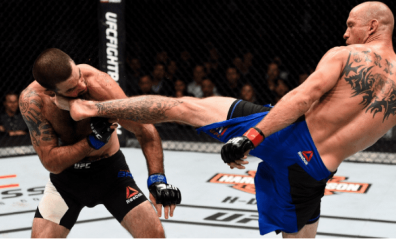 Donald Cerrone nocauteou Matt Brown com um chute alto no terceiro round