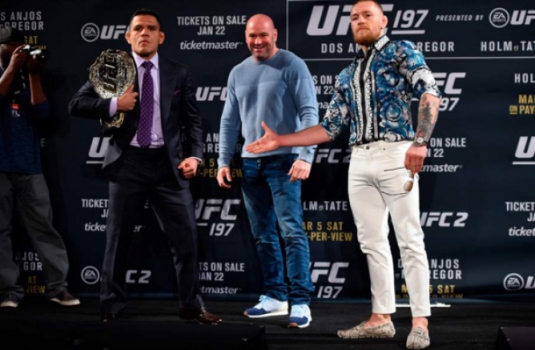 Rafael dos Anjos e Conor McGregor se encaram no UFC 197 (FOTO: Reprodução)