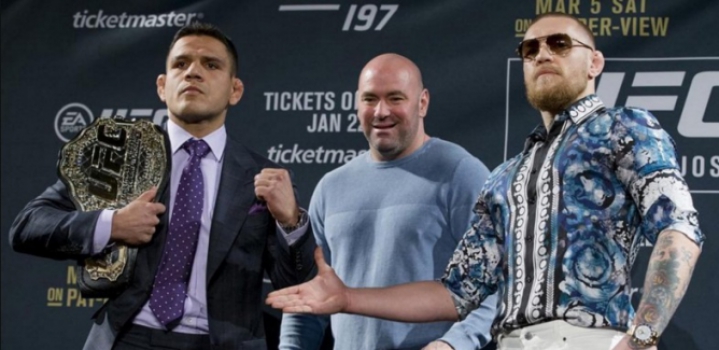 Rafael dos Anjos e Conor McGregor se encaram no UFC 197 (FOTO: Reprodução)