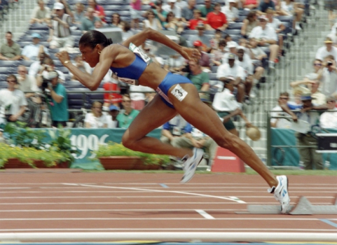 Olímpiadas 1996 - Atlanta - Francesa Marie-Jose Perec fica fora do bloco dos 400m. Pré-eliminatória do evento atletismo.