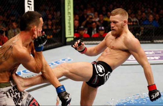 Domínio - Em sua segunda luta no octógono, McGregor venceu Max Holloway na decisão dos juízes com uma atuação dominante