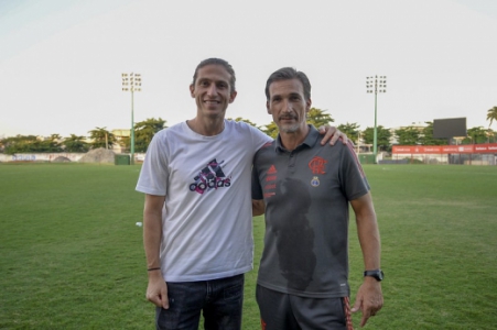 Filipe Luís e o técnico Luis Andrade