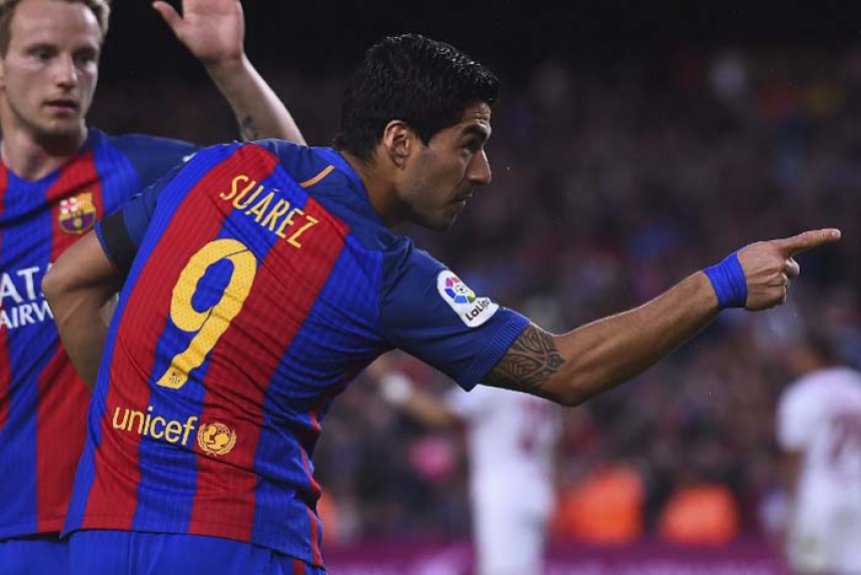 Suárez, inclusive, marcou um golaço, que abriu o caminho da a vitória. Na foto ele aparece comemorando