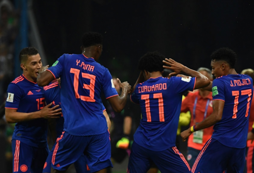 Mina comemora o gol que abriu o caminho para o triunfo colombiano