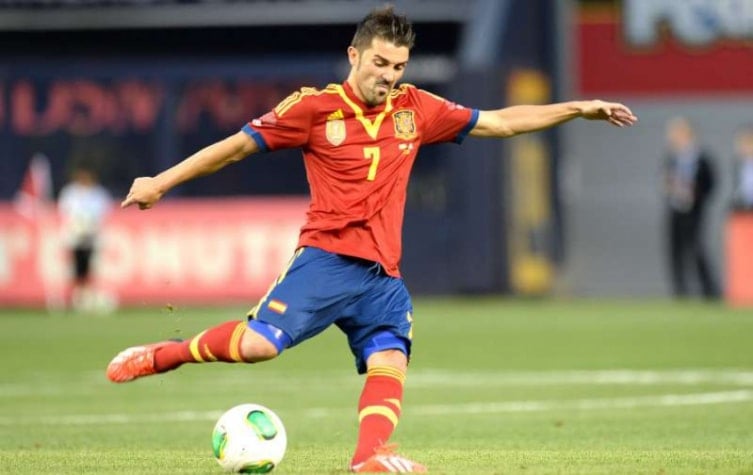 Espanha: David Villa - Atacante (63 gols em 98 jogos entre 2005 e 2017) / Um dos grandes jogadores de sua geração, foi campeão da Eurocopa de 2008 e da Copa do Mundo de 2010.