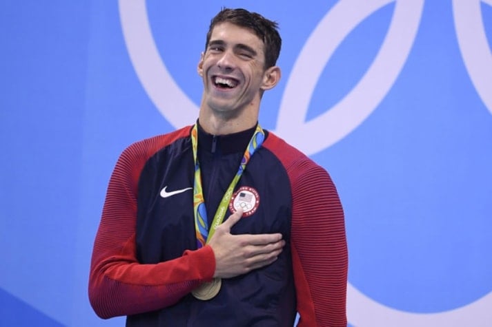 1º - Michael Phelps - Nação: Estados Unidos - Modalidade: Natação - Ouro: 23 | Prata: 3 | Bronze: 2 | TOTAL: 28