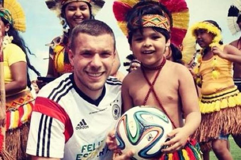 Na estadia da seleção alemã em Santa Cruz Cabrália, local paradisíaco na Bahia, durante a Copa de 2014, Podolski e seus companheiros de seleção tiraram diversas fotos e participaram de momentos inusitados. Um deles foi visitar e tirar fotos com os índios pataxós. Além de muitas imagens e simpatia, a seleção alemã foi abençoada pelos índios.