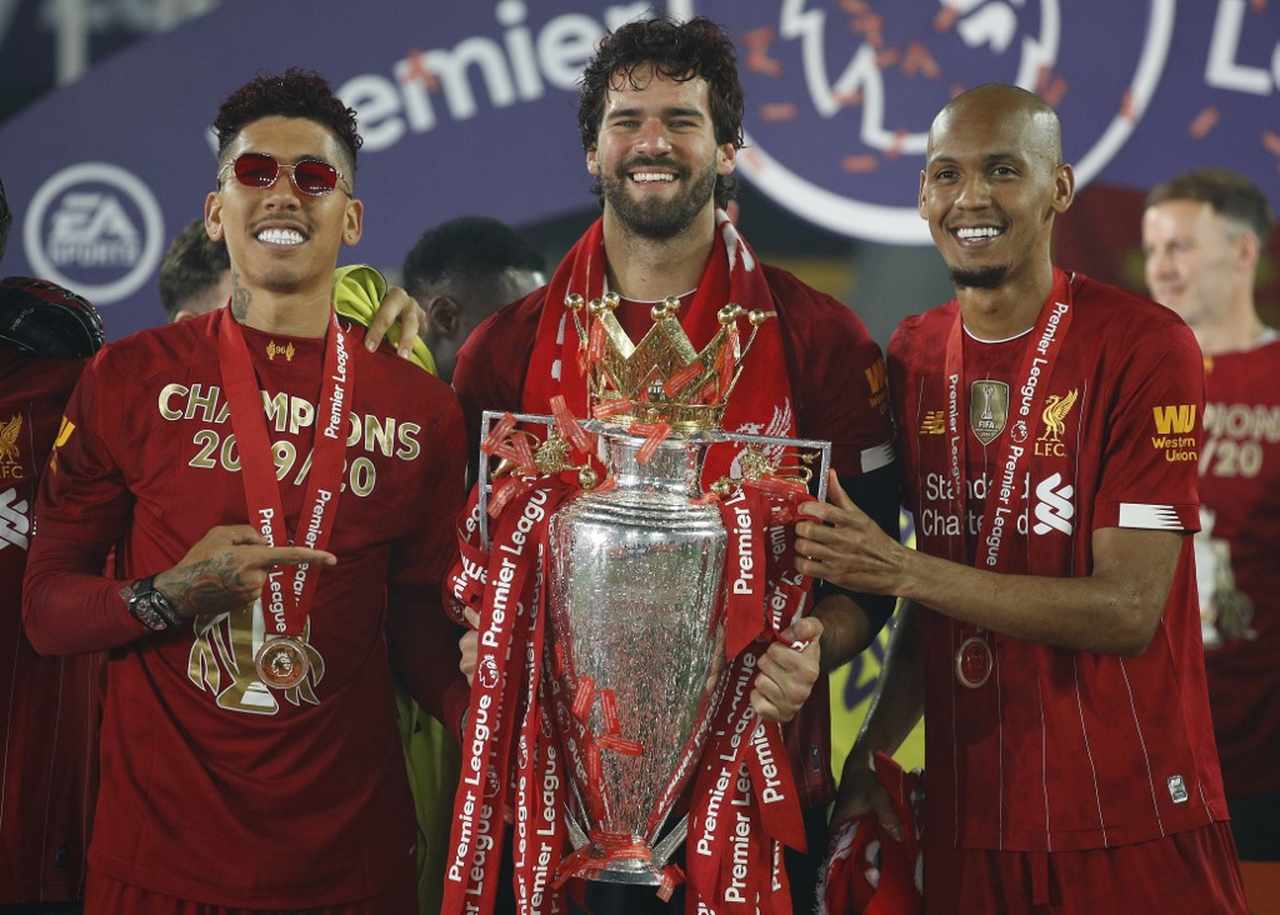 Alisson, goleiro; Fabinho, volante; Roberto Firmino, atacante - Liverpool - 2019