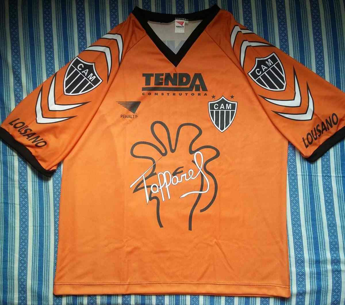 Muitos acreditam que essa camisa laranja que ele usou no Atlético MG em 1997 é a mais bonita. De cor laranja, ela traz o símbolo do mascote do clube, além da assinatura do goleiro. 