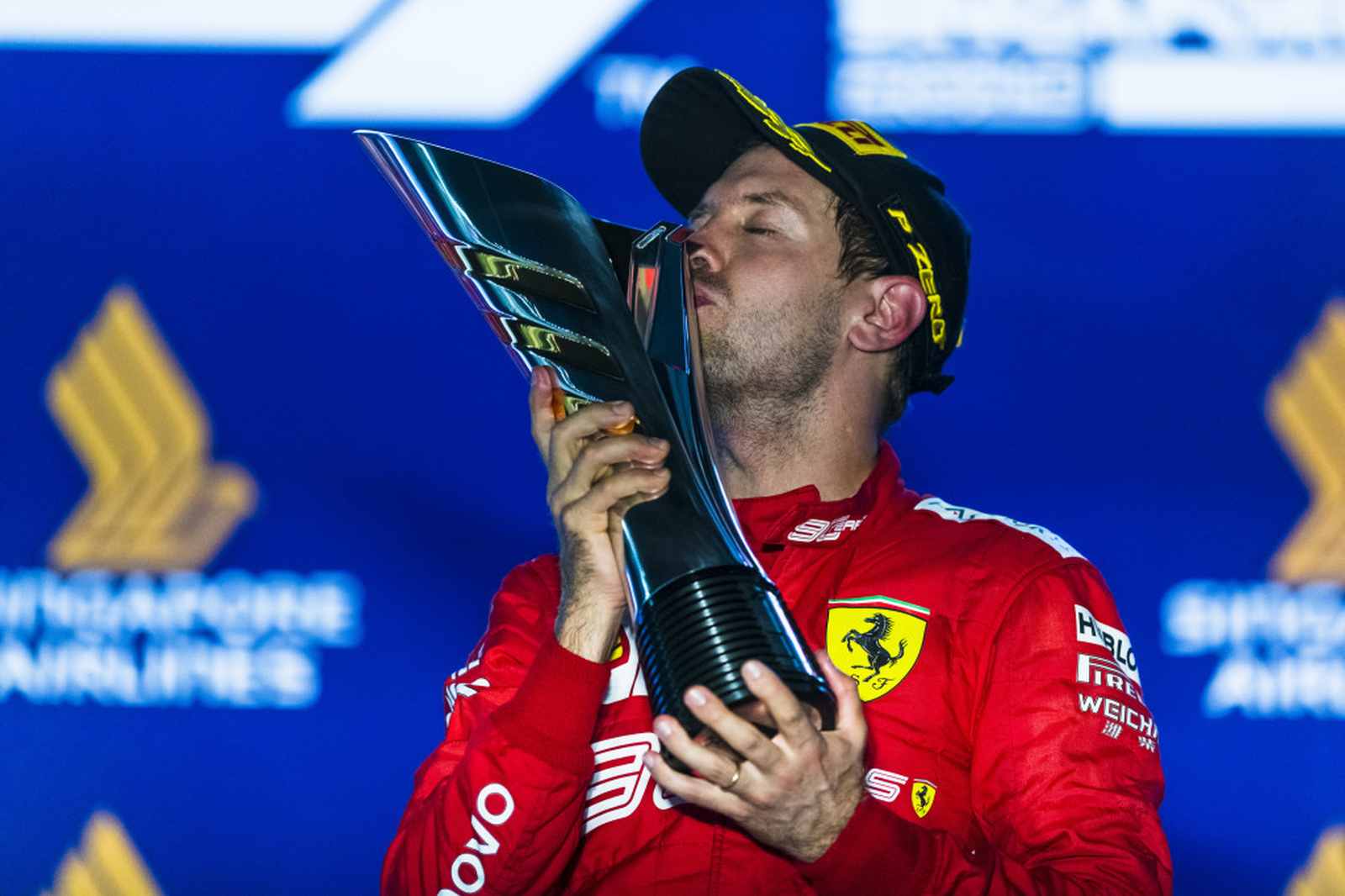2º (empate entre dois) - Sebastian Vettel - Nacionalidade: Alemão - Quantidade de pódios conquistados com a Ferrari: 55