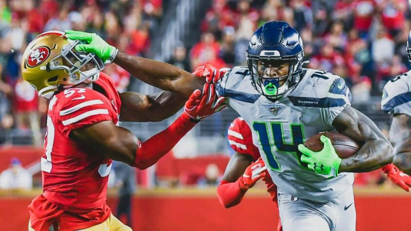 6. DK Metcalf (Seattle Seahawks): A ascensão meteórica do wide receiver dos Seahawks é assustadora para cornerbacks e coordenadores defensivos ao redor da NFL. Esnobado por toda a NFL no draft de 2019, ele vem mostrando evolução em suas rotas, muita força em recepções contestadas e muita velocidade. Em 2020, com 1303 jardas e 10 TDs, ele foi eleito Second-team All-Pro, além de ser indicado para o Pro Bowl.