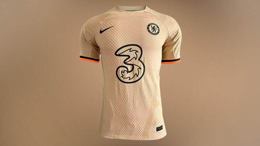 CHELSEA - A terceira camisa do Chelsea é predominantemente dourado com detalhes em preto e laranja nas mangas. A camisa se destaca pela sua cor e poucos detalhes, sendo mais "clean" do que as camisas atuais. 