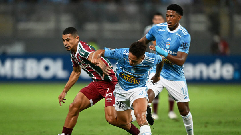 Sporting Cristal-PER - Sobe: O Sporting Cristal começou a partida vencendo o Fluminense. Aproveitou a bobeada da defesa e abriu o placar. | Desce: Por outro lado, a equipe peruana não soube segurar o ímpeto do time brasileiro e cedeu muitos espaços. Com isso, o Tricolor foi letal, virou o placar e liquidou a partida. Para completar, Yoshimar Yotún, foi expulso nos minutos finais