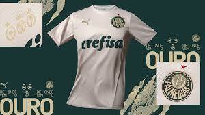 Terceira camisa de 2021 - A camisa trouxe uma tonalidade mais puxada para o creme, fazendo alusão à conquista da tríplice coroa, conquistada pelo Verdão na temporada 2020.