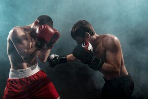 usando luvas de boxe no ringue de luta