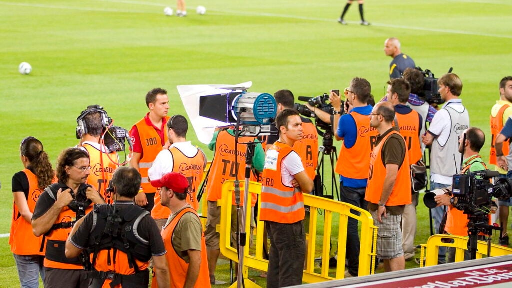 Moda funcional que ajuda fotógrafos a capturar cada lance do futebol